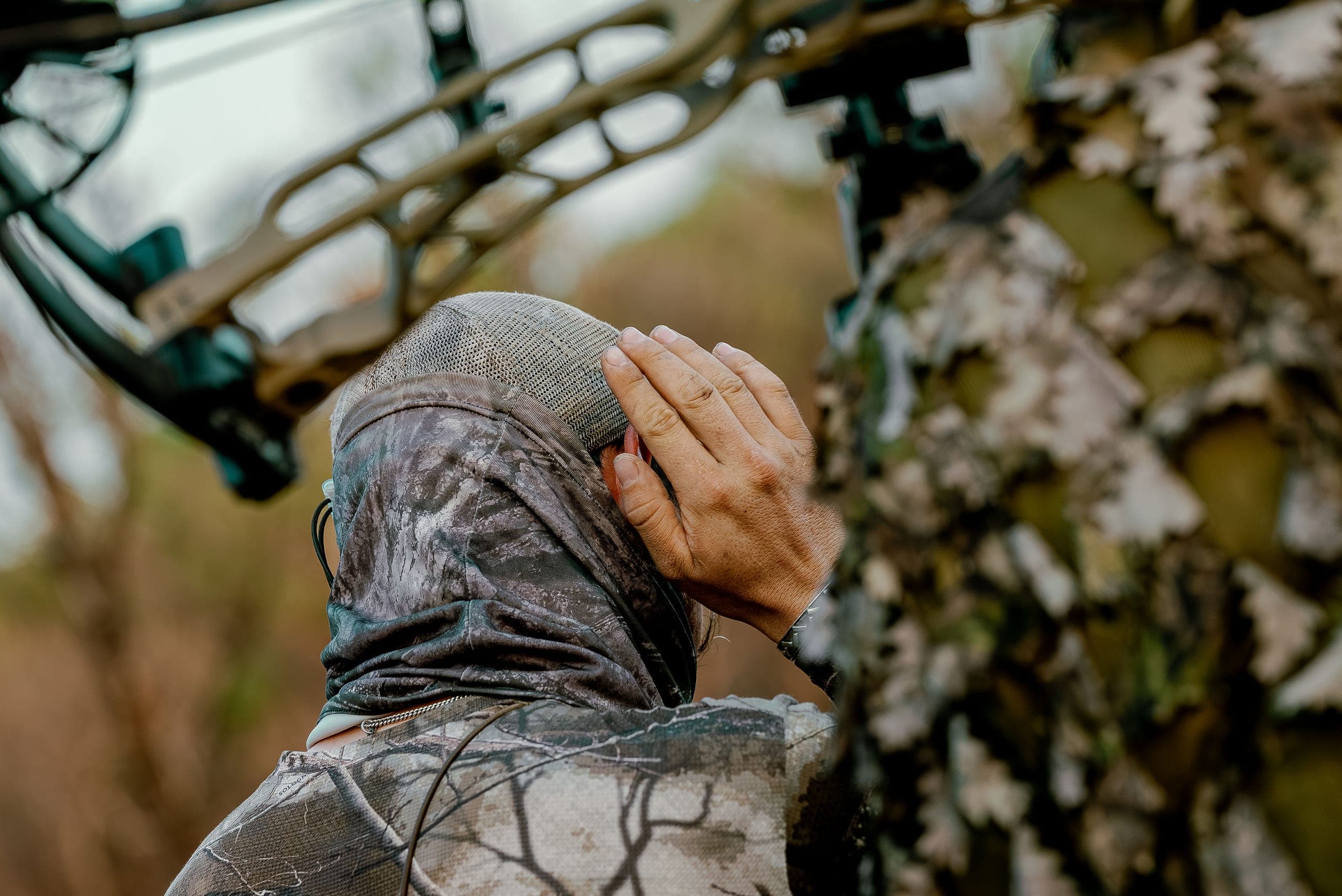 Bowhunter glassing the bush on a fair-chase stalk in Africa